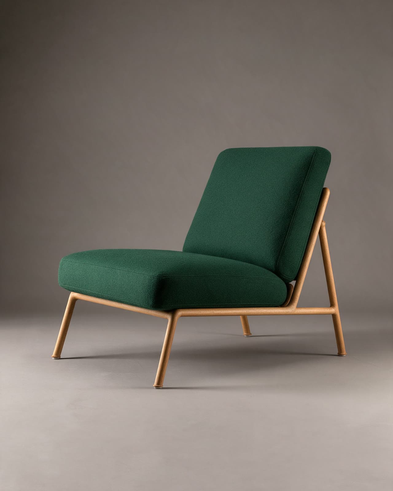 The same lounge chair rendered as a real oak and wool chair in a studio